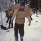 Doug Smith carrying a wolf during the reintroduction years.